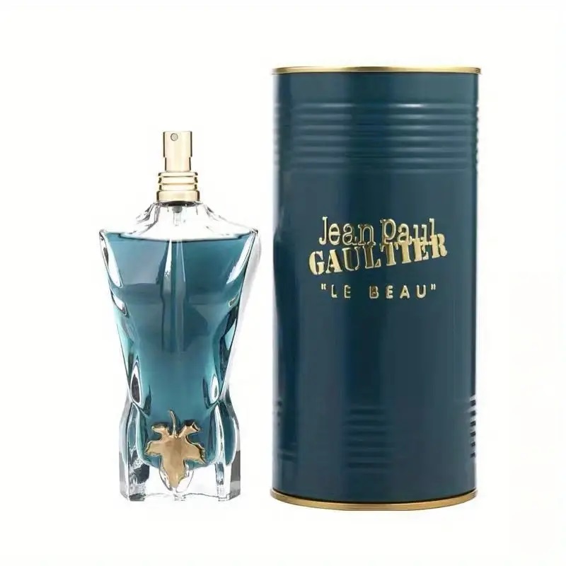 Perfume Fragrance Jean Paul Gaultier Le Male - ジャン・ポール・ゴルチエの「ル・ボ」は目を引く芸術的なボトルを特徴としています。 ココナッツウッディの香りは、従来の男性用香水のスタイルを打ち破り、独特の温かみのある香りを好む男性に最適です。